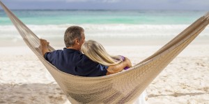 o-OLDER-COUPLE-IN-HAMMOCKS-ON-BEACH-facebook