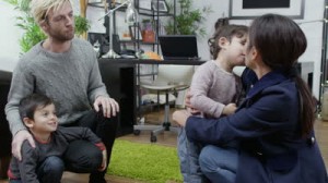 stock-footage-wife-leaves-for-work-and-her-husband-and-children-bid-her-goodbye-and-give-her-hugs